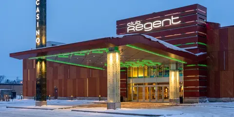 Club Regent Casino entrance on a snowy evening